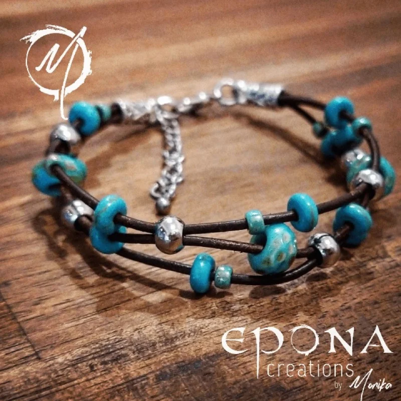 Handmade beaded leather bracelet in turquoise look finish.